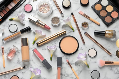 Preview: Many different makeup products and spring flowers on marble background, flat lay