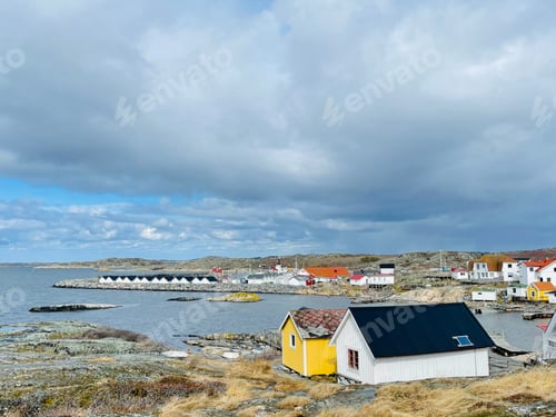 Preview: A view of red wooden houses on Vrango Archipelago island .