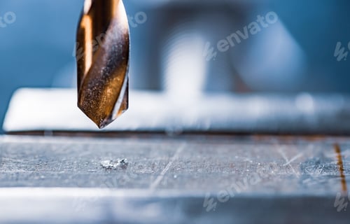 Preview: Drill close-up at the workplace in workshop