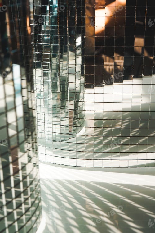 Preview: Elegant background of walls of pieces of mirror and the sun light