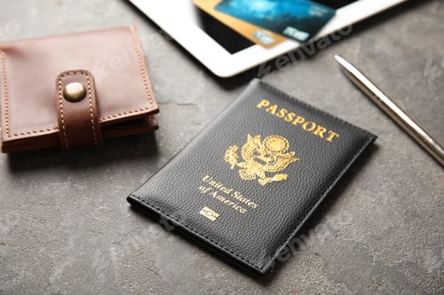 Preview: Composition with passport and wallet on grey table. Travel agency