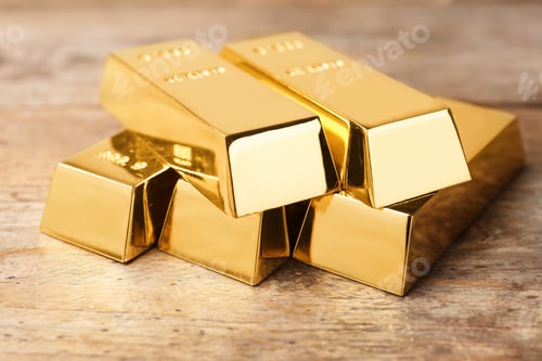 Preview: Precious shiny gold bars on wooden background