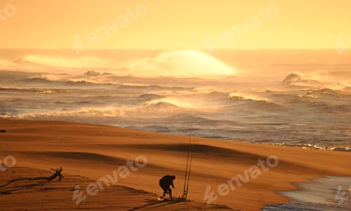 Preview: Lone fisherman on the beach
