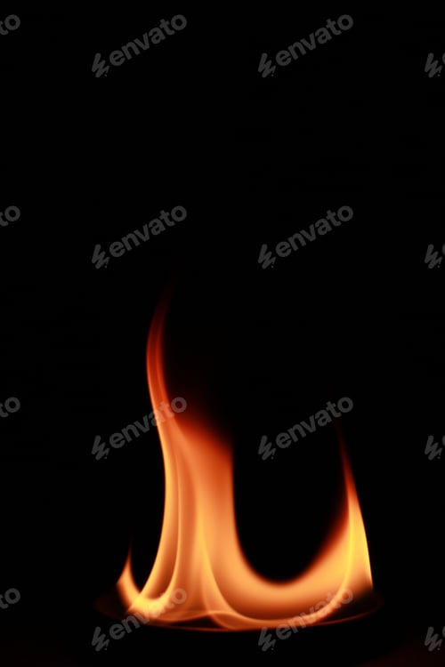Preview: Vertical shot of flames isolated on a black background for textures
