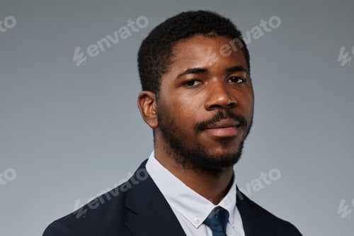 Preview: Portrait of Black Businessman on Grey