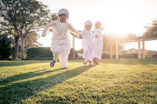 Preview: Children playing together in Dubai in the park.
