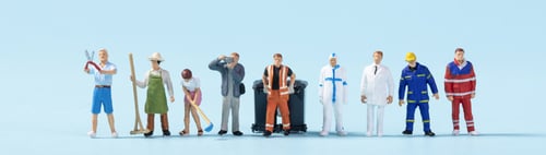Preview: Closeup of toy people with different jobs on a blue background