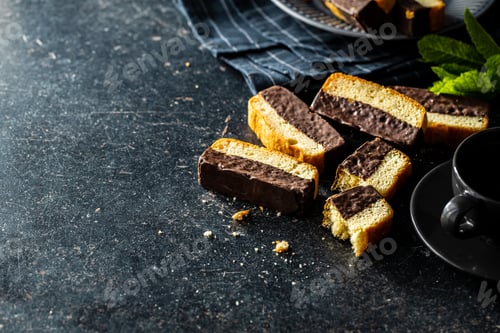 Preview: Sliced sponge dessert. Sweet sponge cake with chocolate