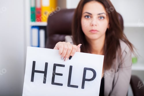 Preview: Attractive Young Tired and Frustrated Business Woman Working on Her Computer Asking For Help