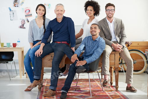 Preview: The dream design team. Portrait of a team of designers in their modern office.