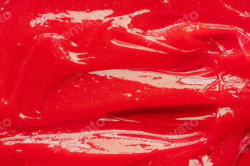 Preview: Red gel texture. Cosmetic clear liquid cream smudge. Skin care product sample closeup. Toothpaste or
