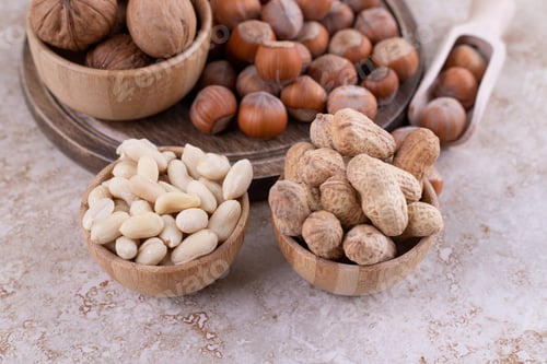 Preview: A wooden board full of healthy various nuts