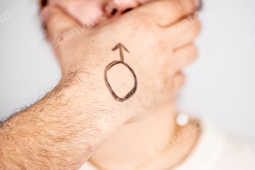 Preview: Man covering the mouth of a woman with the man symbol painted on his hand.