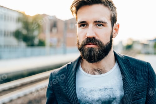 Preview: Young bearded man outdoor