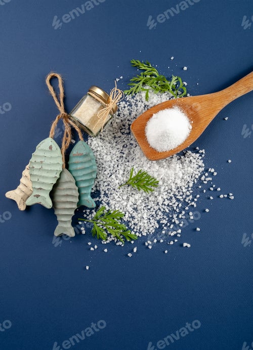 Preview: Fine and coarse salt with decor on a dark blue background.