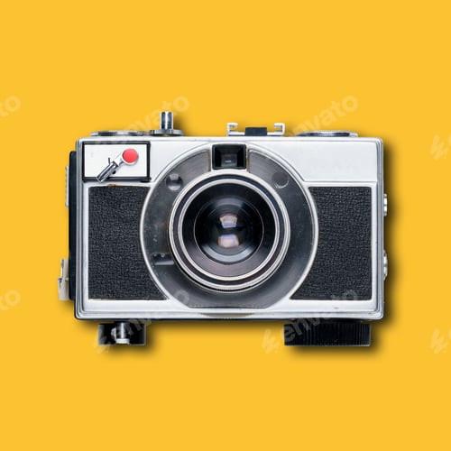 Preview: vintage old film camera on yellow background