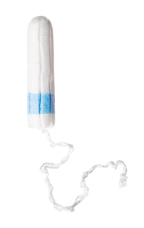 Preview: Unpacked female medical tampon isolated on white background