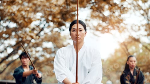 Preview: Sensei, bamboo sword and Asian people for martial arts, Kendo practice and exercise in park. Cultur