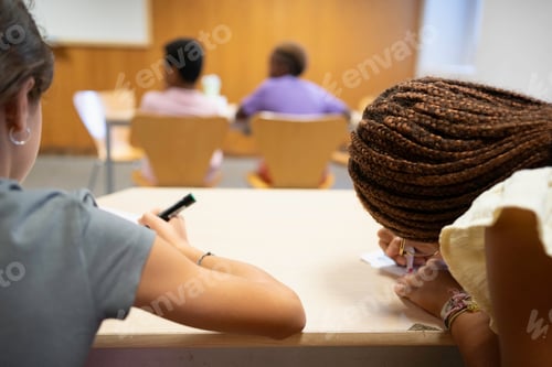 Preview: Diverse students learning and writing in diverse classroom environment