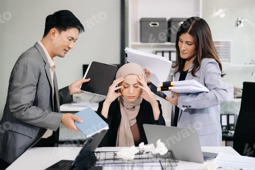Preview: Asian Business Surrounded by Overwhelming Paperwork Concept of Workplace Anxiety and Overwork