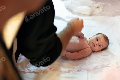 Preview: A baby girl is christening in an orthodox church