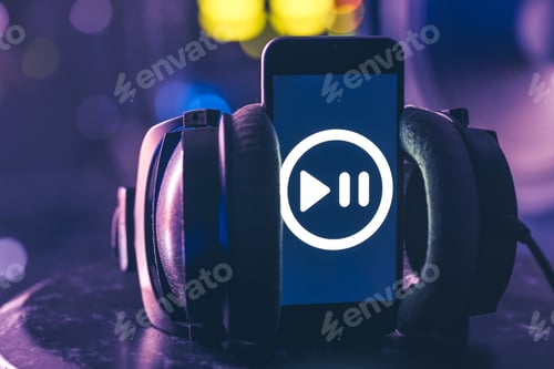 Preview: Musical background with a phone and headphones on a dark background.