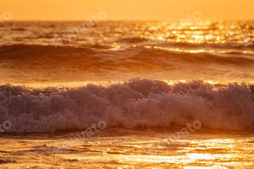 Preview: Breaking ocean wave on sunset