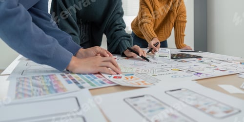 Preview: Ux Ui development team discussing meeting working together at working table in office
