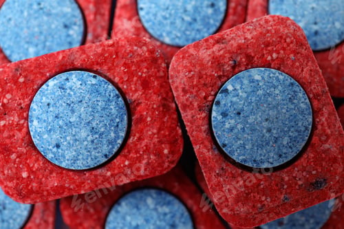 Preview: Dishwashing tablets on whole background, close up