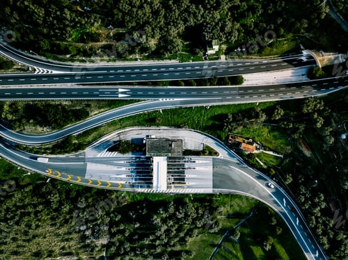 Preview: Aerial view of highway, expressway and motorway with a toll payment point in Italy
