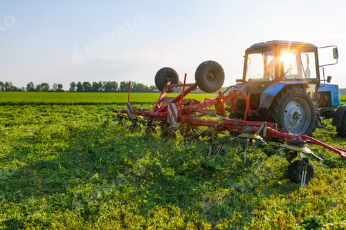 Preview: Tractor Harvesting Clover for Animal Feed Preparation on Modern Sustainable Farm