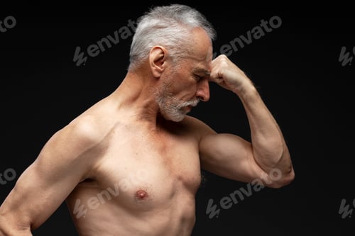 Preview: Portrait of handsome pensive mature gray haired man with naked torso with closed eyes