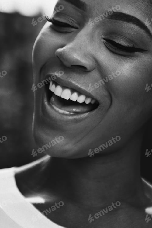 Preview: Close up of a cheerful black woman