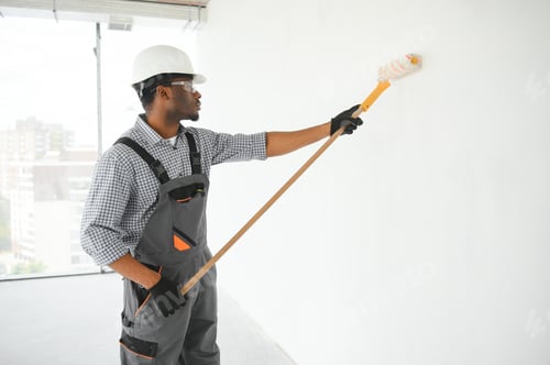 Preview: painter man painting the wall, with paint roller