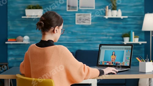 Preview: Graphic designer retouching picture for online editing class