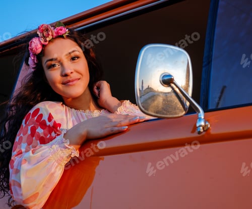 Preview: Beautiful hippie girl in a van
