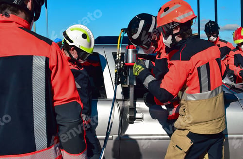 Preview: Firefighters rescuing a victim from a car during an accident