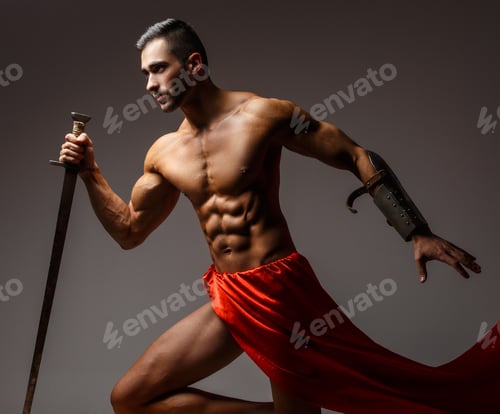 Preview: Naked man in a red dress.