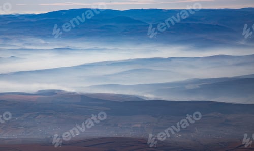 Preview: Aerial view on mountain peaks.