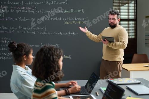 Preview: Caucasian Man Teaching Diverse Teenagers Computer Programming