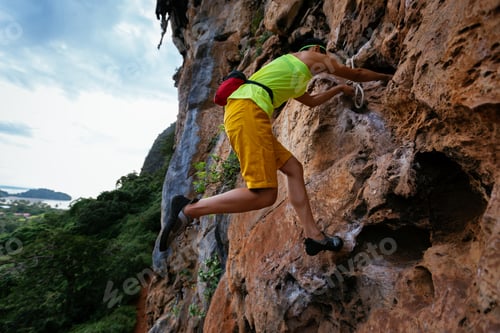 Preview: Woman rock climber