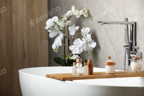 Preview: Different personal care products on bath tray indoors