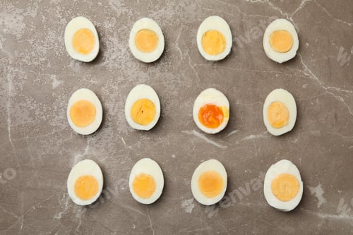 Preview: Flat lay with boiled eggs on gray background, top view