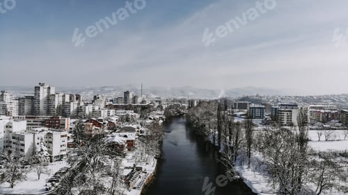 Preview: Aerial shot of the city of Banjakuka covered with snow at daytime