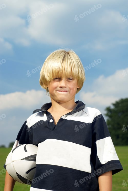 Preview: boy holding rugby ball