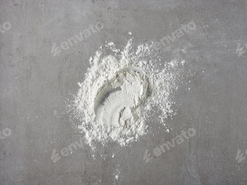 Preview: white flour on grey kitchen table