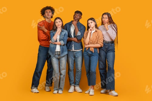 Preview: Group of Diverse Young Adults Thinking Together on Yellow Background