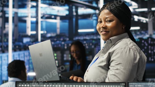 Preview: Portrait of joyous server hub technician using AI visualization insights