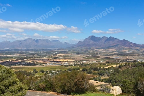 Preview: Aerial shot of a village surrounded by mountains