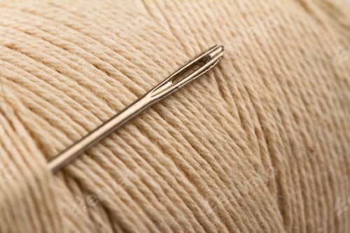 Preview: sewing needle on thread